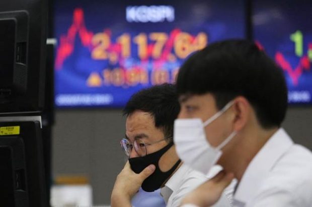 Asian stocks follow Wall Street higher on vaccine hopes