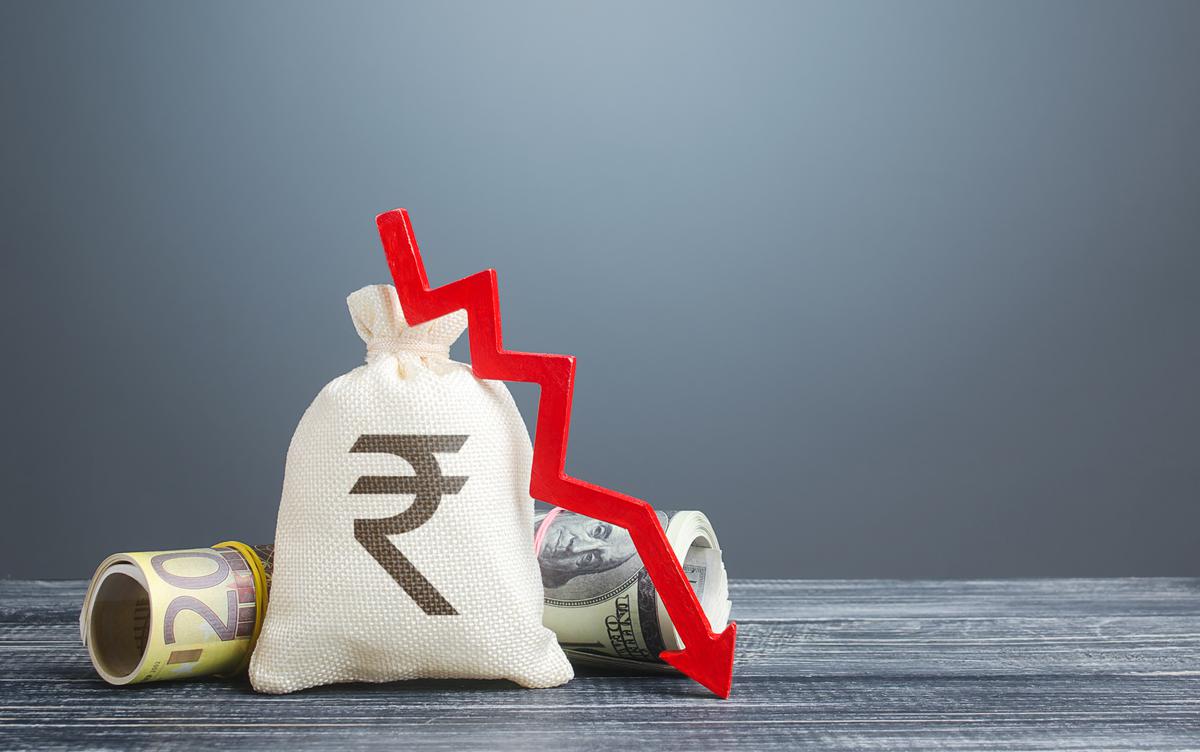 Rupee declines to lifetime low, RBI intervention caps losses